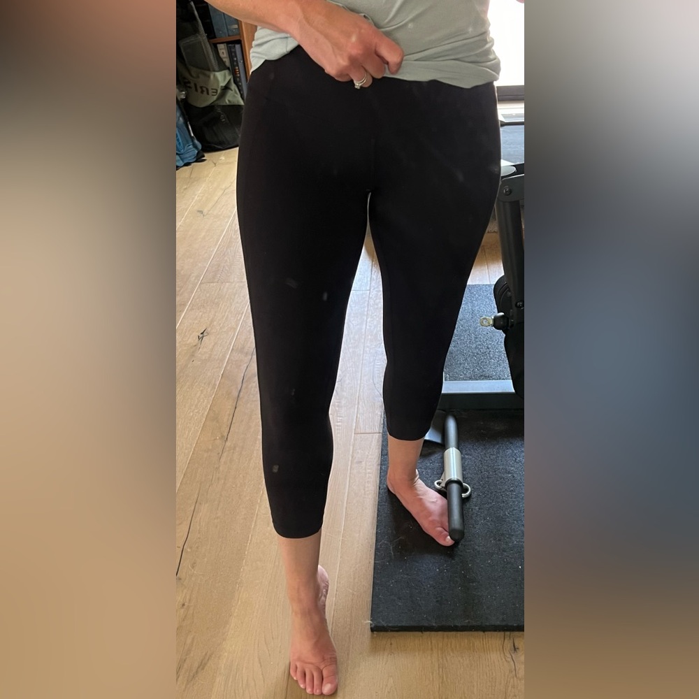 Athleta black mid-calf length leggings in Size XS.